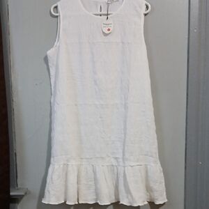 Nassau White Sleeveless Ruffle-Hem Mini Dress by Nassau